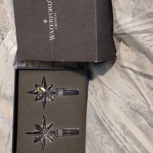 Pair Waterford star bottle stoppers